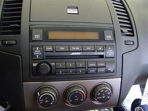 <b>Nissan</b> <b>Altima</b> Storage Cubby 2005 <b>2006</b> BROWN Dash <b>Radio</b> <b>Bezel</b> AC Vents 06 05 Pre-Owned C $267. . 2006 nissan altima radio bezel